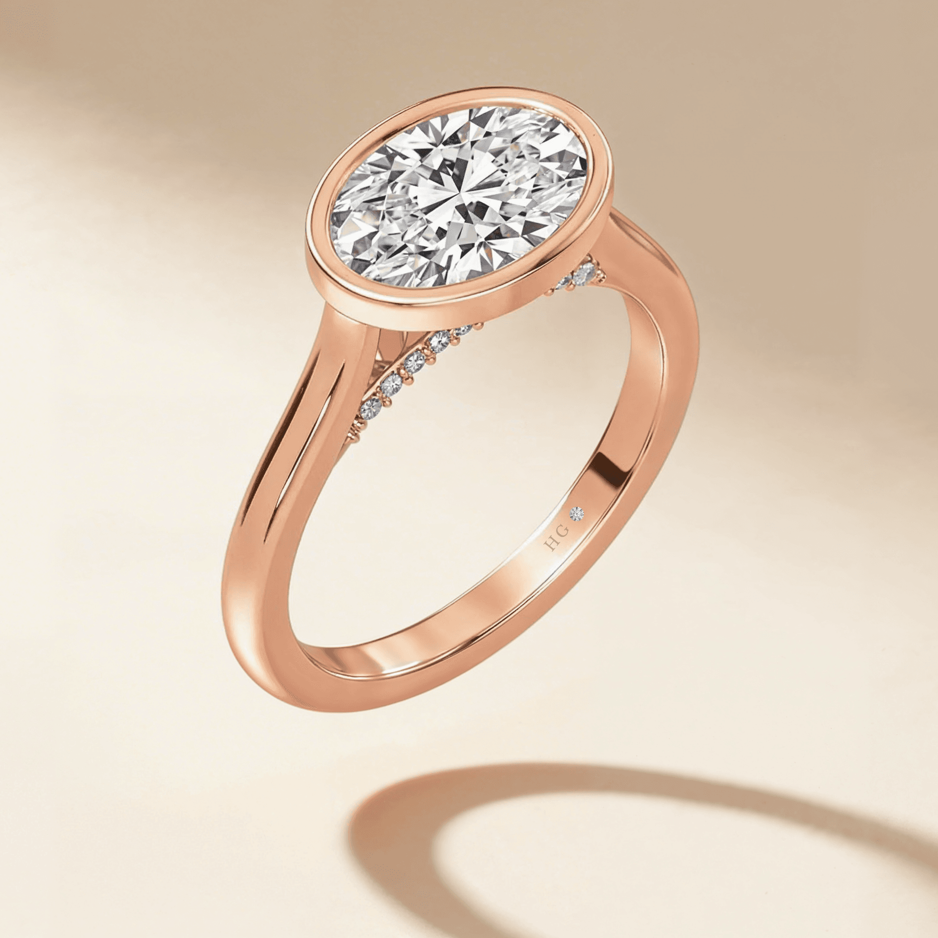 Oval bezel pavé engagement ring